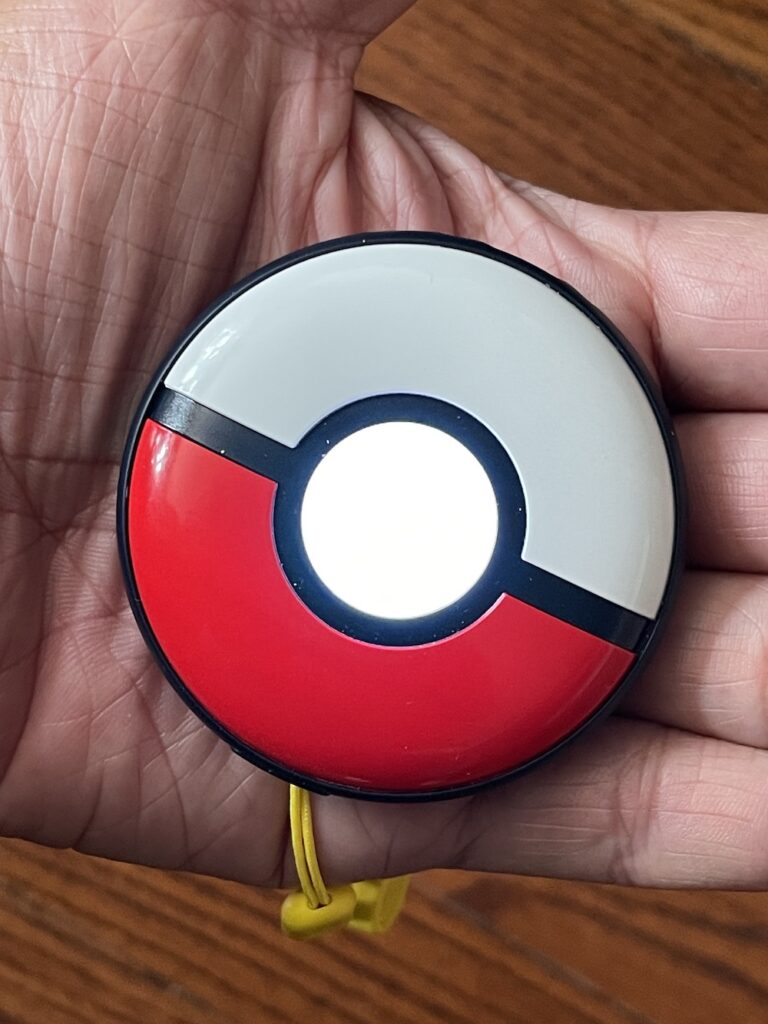 pokemon sleep device in hand